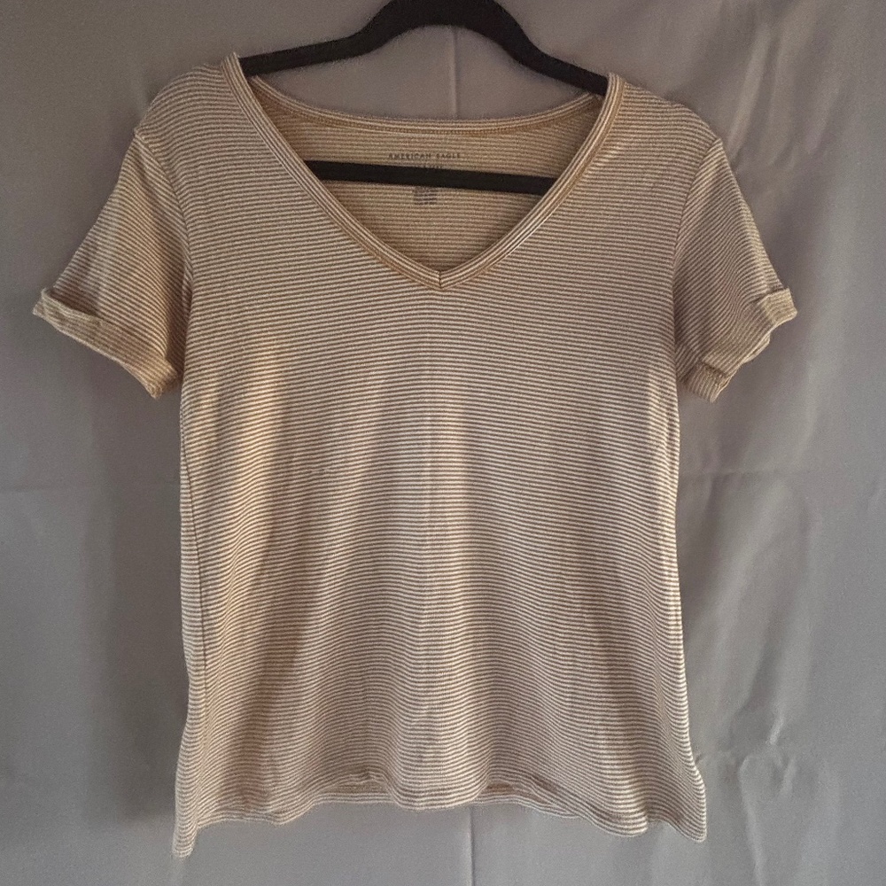 Size xx-small American Eagle soft and sexy pale yellow and white tee.
